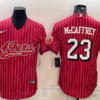 Men’s San Francisco 49ers #23 Christian McCaffrey Red Pinstripe Color Rush With Patch Cool Base Stitched Baseball Jersey