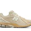 AURALEE x New Balance 1906R ‘Bone White’ M1906RAU